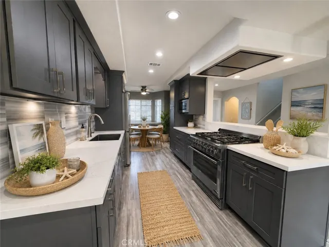 large gourmet custom- built kitchen-  Digitally staged photo