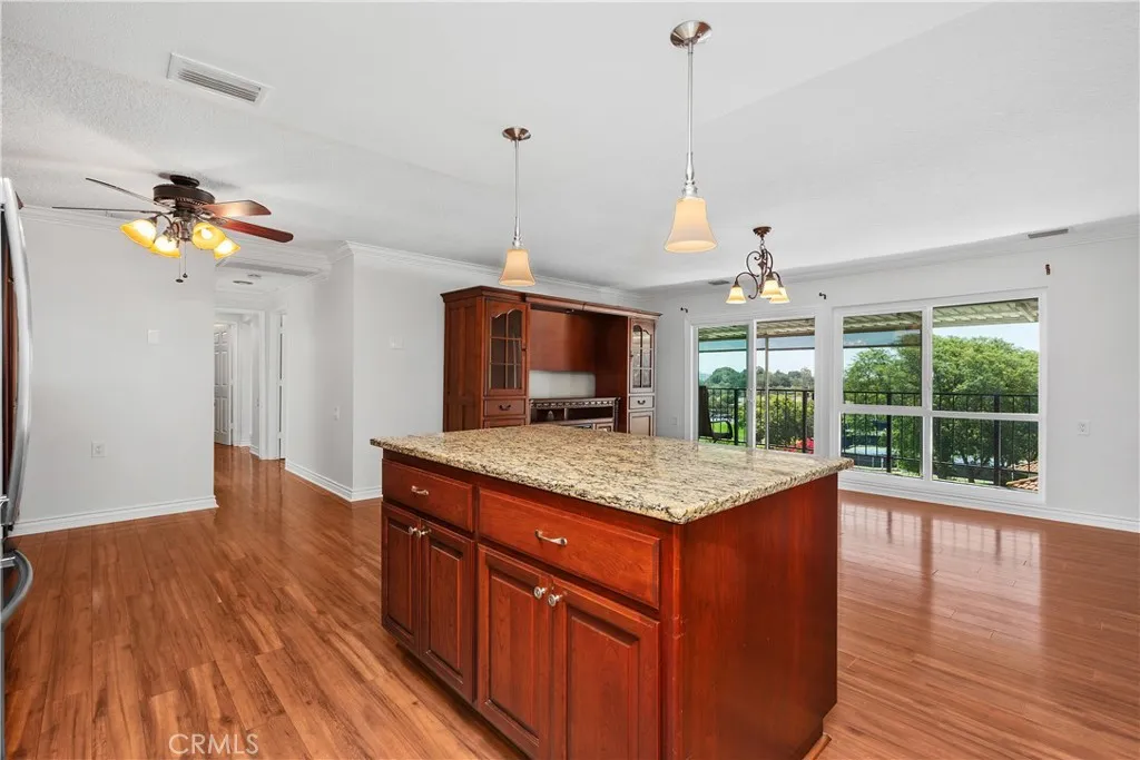 Kitchen opens up the livingroom with views. Kitchen opens up the livingroom with views.