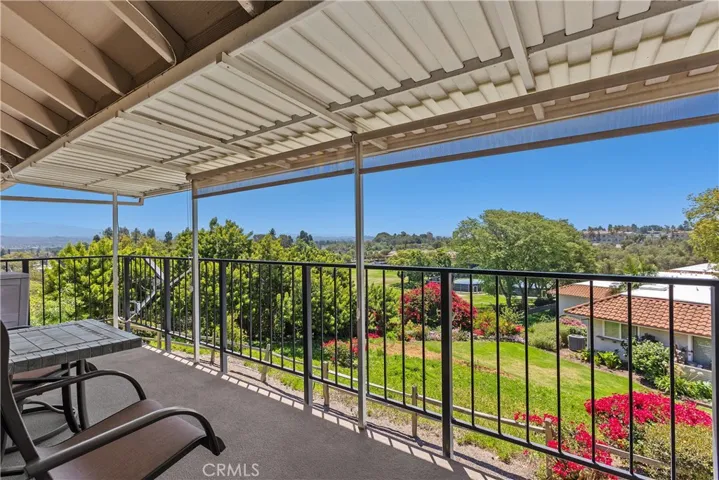 Deck overlooking the golf course and the pickleball courts.