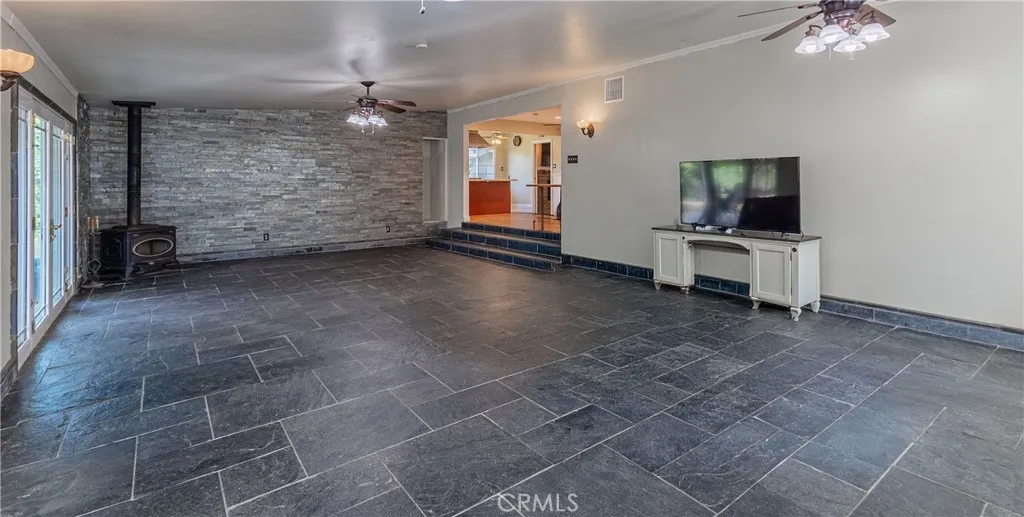 Great room w natural stone wall