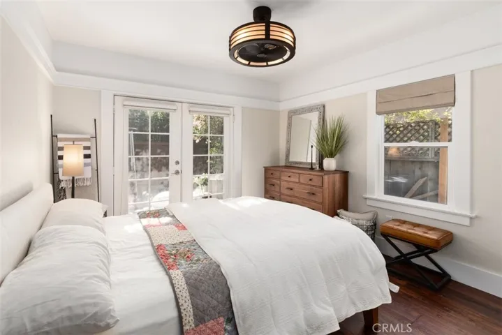 MASTER BEDROOM W FRENCH DOORS TO OUTDOOR BACK PATIO