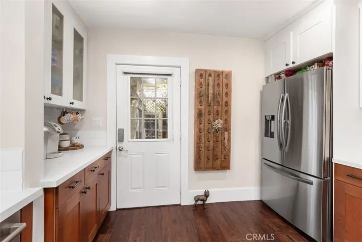 PLENTY OF KITCHEN COUNTER SPACE EASY ACCESS TO OUTDOOR PATIO/ DINING