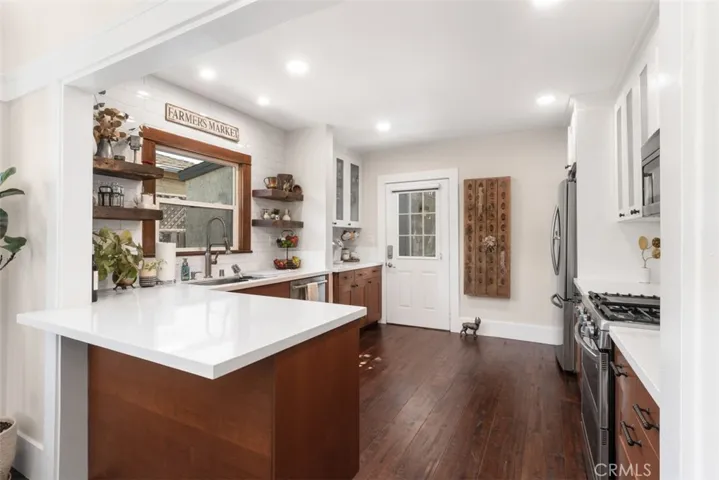 KITCHEN WITH DOOR TO BACKYARD