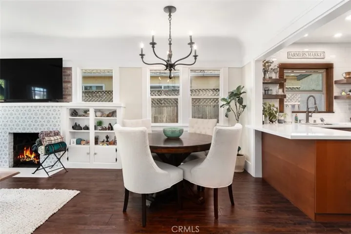 OPEN LIVING AREA INCLUDING DINING SPACE AND EAT UP KITCHEN BAR/ISLAND