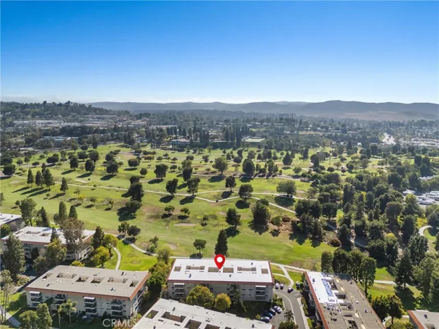 Aerial view of the building within the community