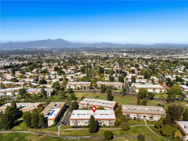 Aerial view of the community with mountain views