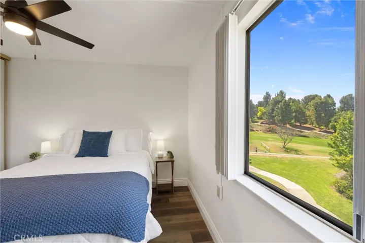 Secondary bedroom with scenic golf course views