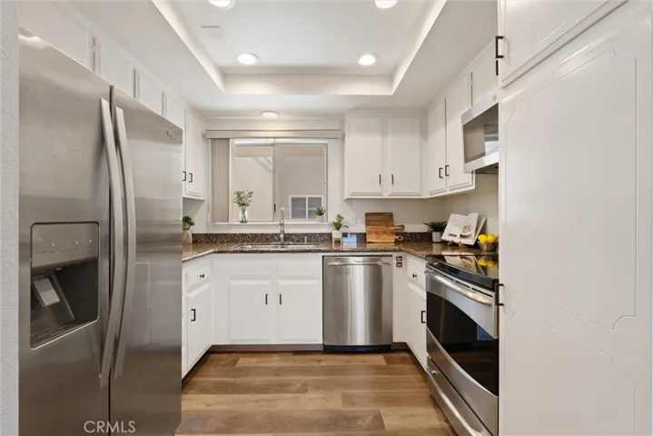 Kitchen area with granite countertops