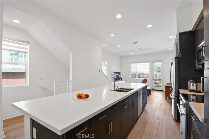 Kitchen and Long Island with Barstool