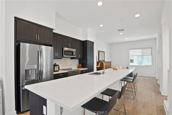 Kitchen and Long Island with Barstool seating for 6!