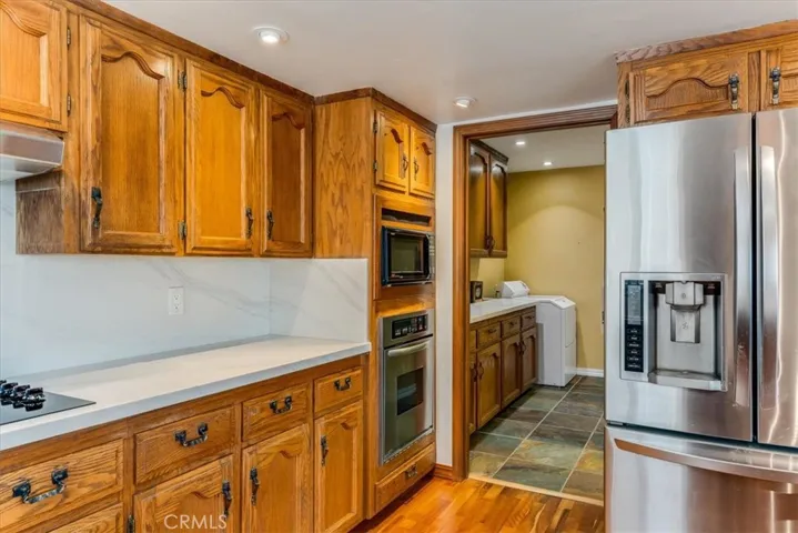 Laundry room and separate walk in pantry off of kitchen