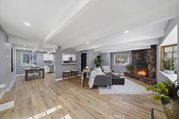 One of 3 fireplaces and open floorplan