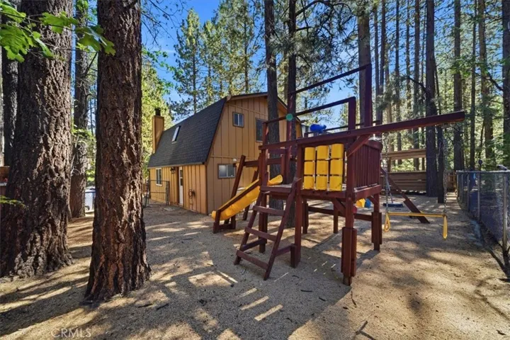 Kids play area with swing and slide