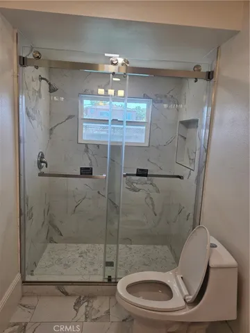 FULL 1ST FLOOR BATHROOM #3 WITH TILED WALK-IN SHOWER AND SHOWER DOOR