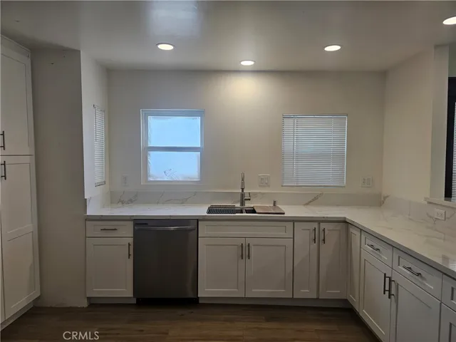 KITCHEN WITH NEW STAINLESS STEEL DISHWASHER AND NEW RUVATI KITCHEN SINK