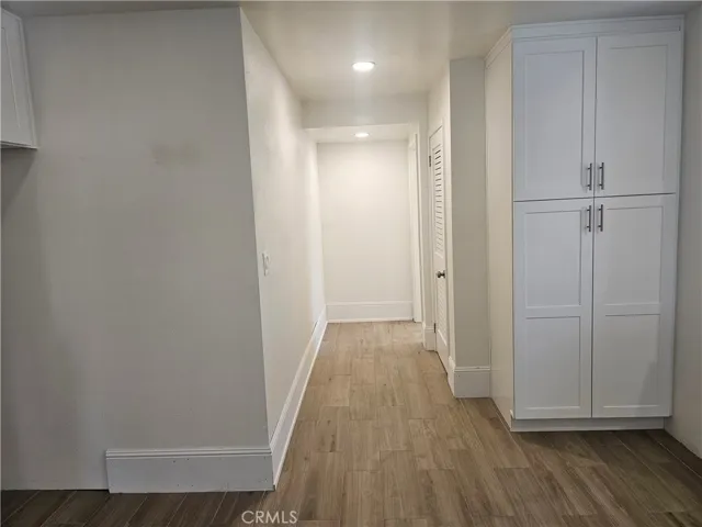 PANTRY IN KITCHEN. PASSAGE LEADS TO LAUNDRY ROOM