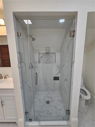 FULL BATHROOM #2 WITH TILED WALK-IN SHOWER AND SHOWER DOOR