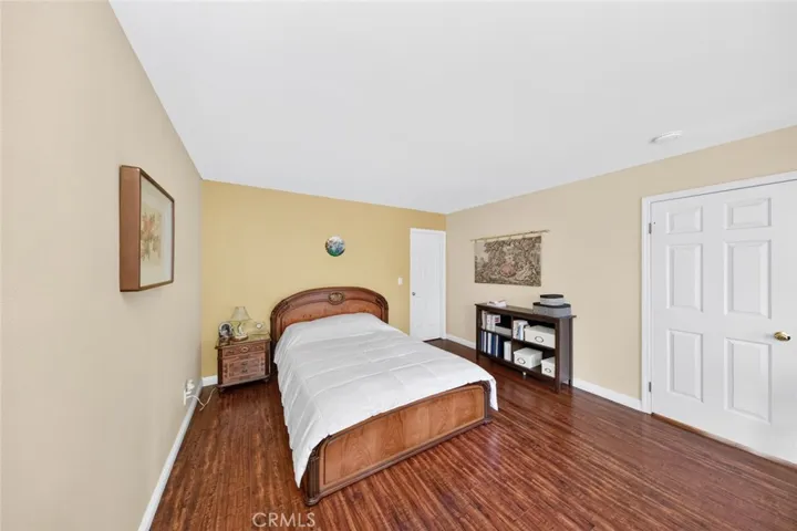 Spacious primary bedroom offering a comfortable retreat with generous living space