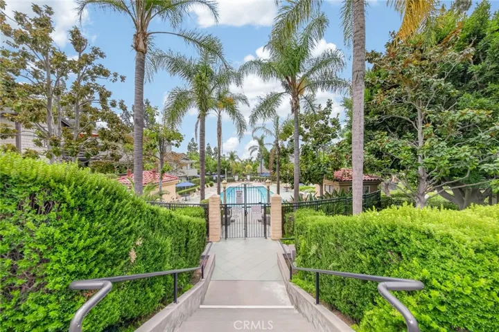 Enjoy resort-style living in this beautiful gated community featuring a sparkling pool and spa