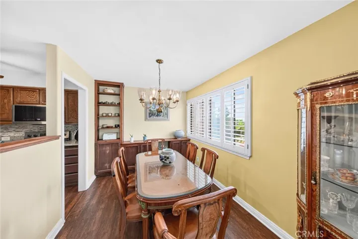 Elegant dining room featuring custom built-in cabinetry