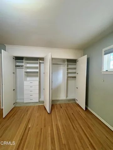 Primary bedroom closet open