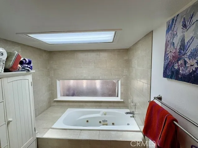 Large bathroom with deep soak jetted tub