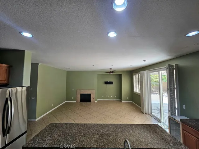 Kitchen open to family room with access to rear yard