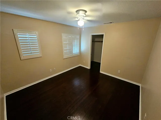 Secondary bedroom with walk in closet