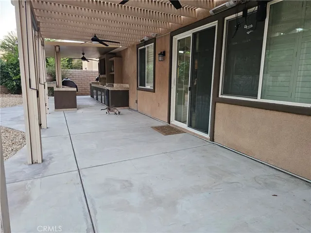 Covered patio off family room/kitchen