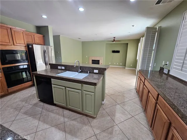 Kitchen island and large buffet area, offers plenty of storage, and ability to host large family gatherings