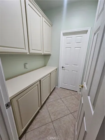 Downstairs linen cabinets going into the bathroom