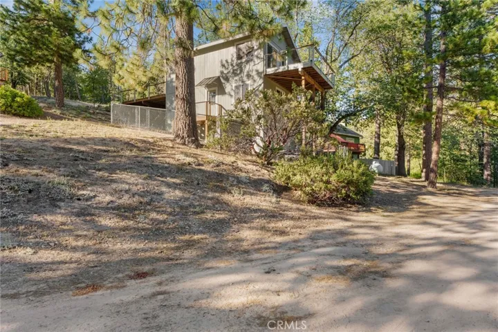 Back view of house with plenty of privacy.