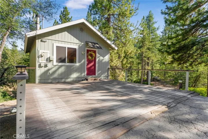 Welcome to 32715 Willow Ln Located in the beautiful town of Arrowbear Lake, CA