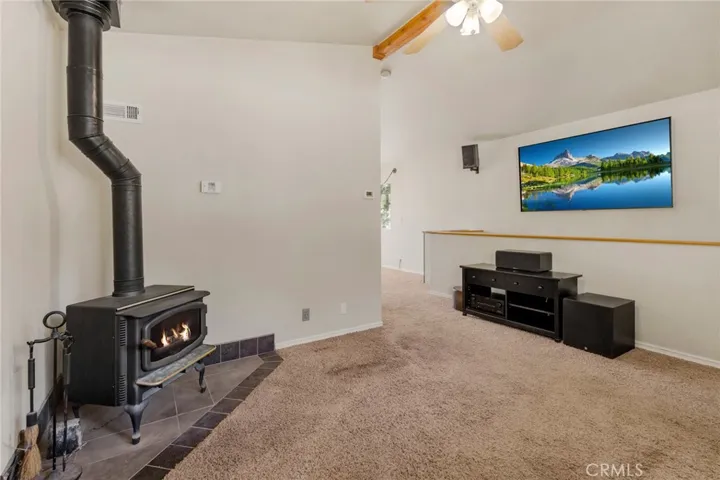 Living room with wood burning stove.