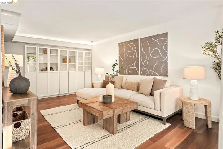 Hardwood-style flooring throughout this living space