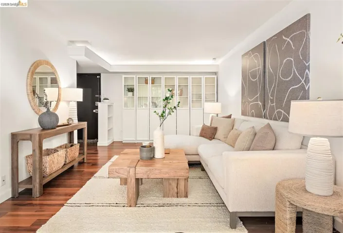 Hardwood-finish flooring extending into the open living area