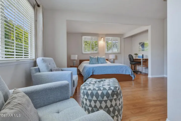 airs bedroom with sitting area