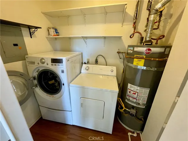 Private Laundry closet w washer and dryer and added storage