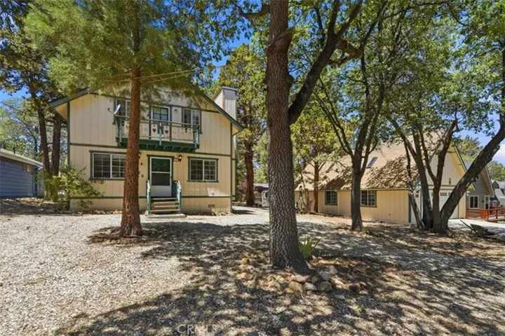 SFR with two story detached garage.