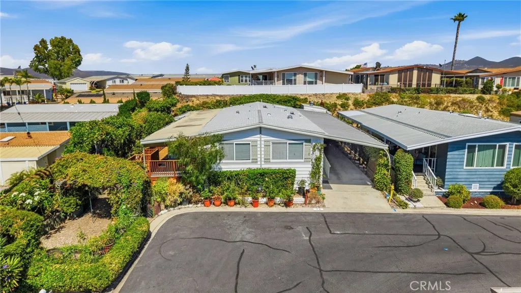 Huge corner lot with garden and wrap around deck!