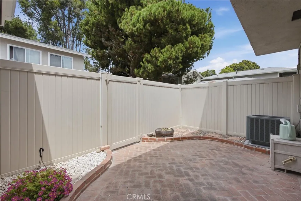 Patio w/ tall vinyl fence