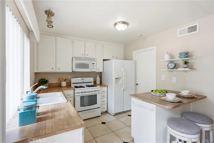 Kitchen to laundry room & pantry