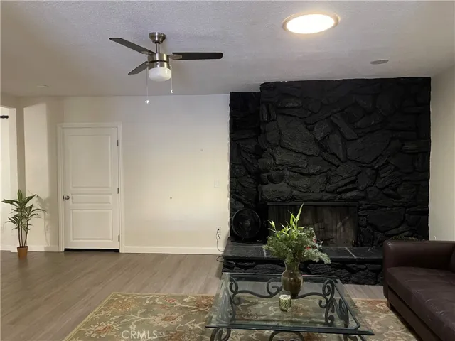 Main house fireplace and living area
