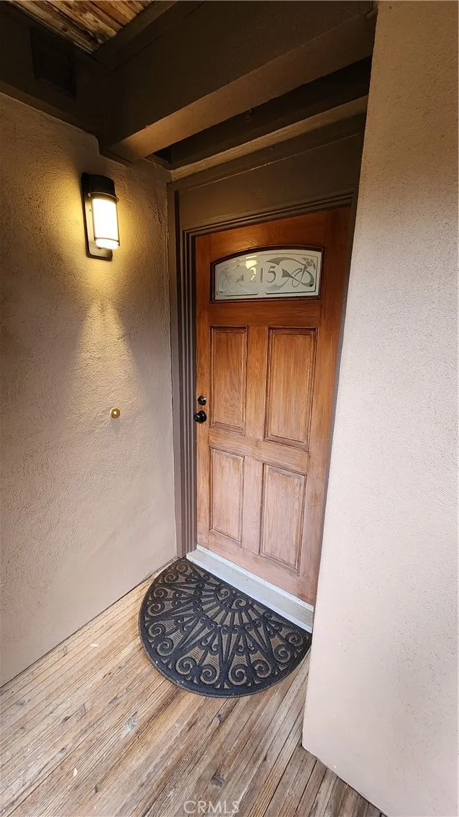 Front Door to Your Unit with porch light and doorbell