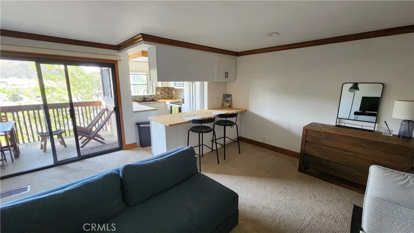 Breakfast bar opens kitchen to Living/Dining