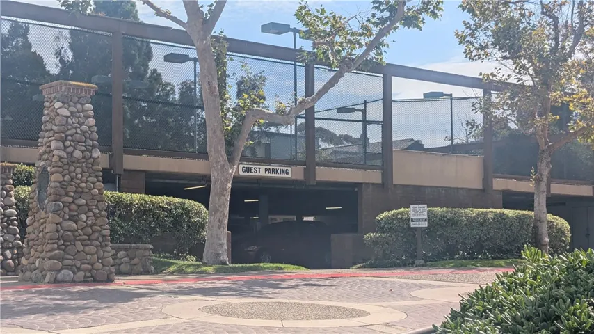 Guest Parking is adjacent to clubhouse, tennis courts and pool.