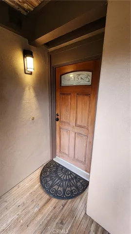 Front Door to Your Unit with porch light and doorbell