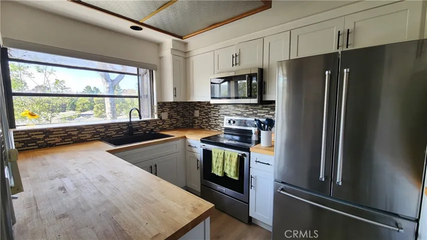 Updated functional, light and airy, kitchen with views