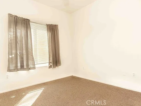 Bedroom number one Before new flooring