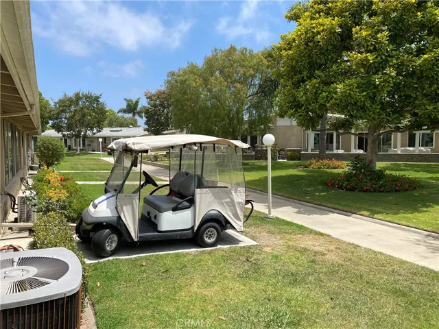 View to the left from front porch.  Golf cart is negotiable!